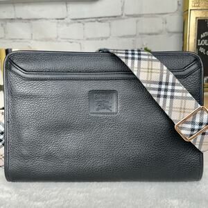 Burberrys Vintage leather crossbody Clutch or shoulder bag or crossbody